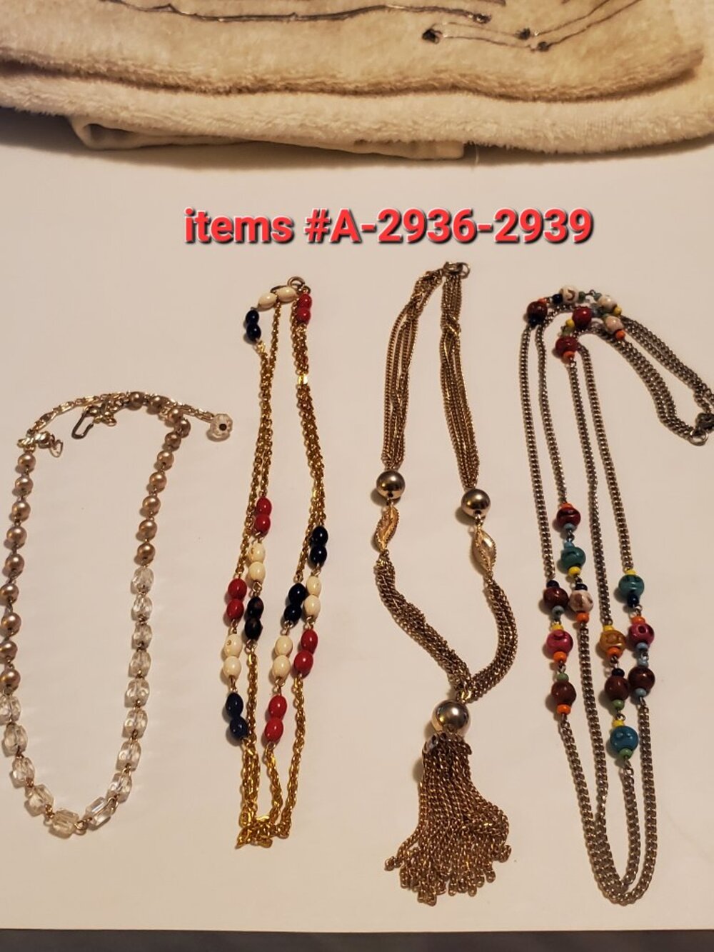 4 Necklaces, items # A-2936-2939,. wt .83 grams.